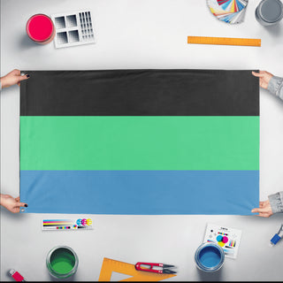 A mockup of the custom flag 'Faiterian Order 1.0 flag' held up on a table during print checking
