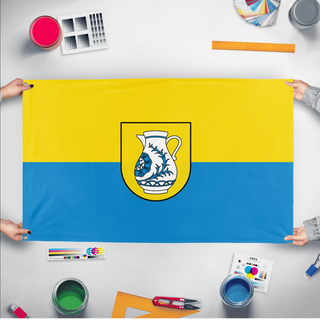 A mockup of the custom flag 'Schrezheim flag' held up on a table during print checking