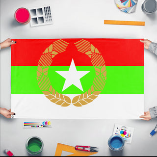 A mockup of the custom flag 'Republic of new abhakzia flag' held up on a table during print checking