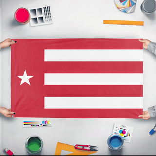 A mockup of the custom flag 'Default flag' held up on a table during print checking