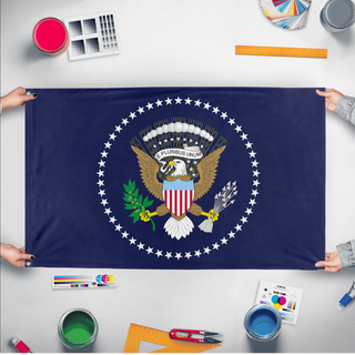 A mockup of the custom flag 'United States Presidential Seal flag' held up on a table during print checking