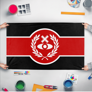 A mockup of the custom flag 'Trinireign flag' held up on a table during print checking