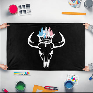 A mockup of the custom flag 'recalcitrant flag' held up on a table during print checking