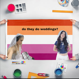 A mockup of the custom flag 'lessi x erin flag' held up on a table during print checking