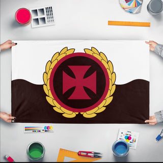 A mockup of the custom flag 'Crusader Empire flag' held up on a table during print checking