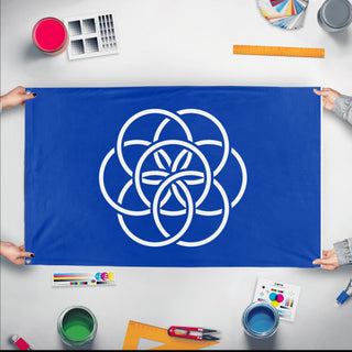 A mockup of the custom flag 'earth flag' held up on a table during print checking