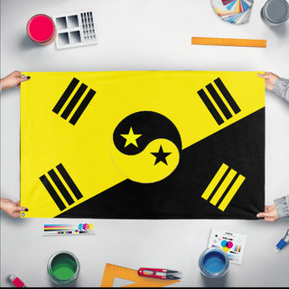 A mockup of the custom flag 'Anarcho  Capitalist Korea flag' held up on a table during print checking