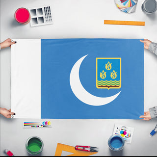 A mockup of the custom flag 'Baku flag' held up on a table during print checking