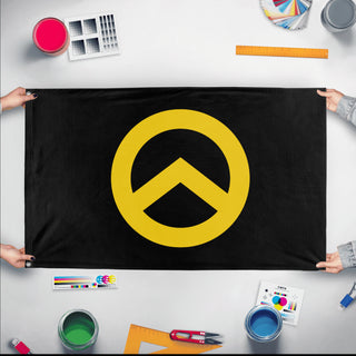 A mockup of the custom flag 'Mouvence Identitaire flag' held up on a table during print checking