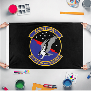 A mockup of the custom flag '71 SOS flag' held up on a table during print checking