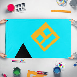 A mockup of the custom flag 'Geometry Logo flag' held up on a table during print checking