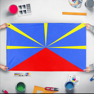 A mockup of the custom flag 'test3 flag' held up on a table during print checking