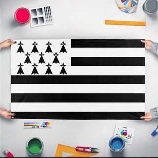 A mockup of the custom flag 'test28 flag' held up on a table during print checking