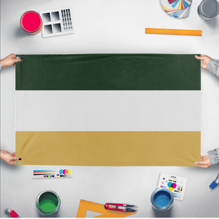 A mockup of the custom flag 'Bungesie flag' held up on a table during print checking