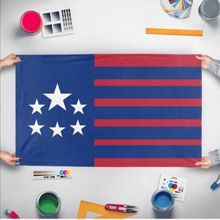 A mockup of the custom flag 'Eastern States flag' held up on a table during print checking