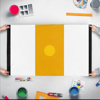 A mockup of the custom flag 'Great Brighton flag' held up on a table during print checking