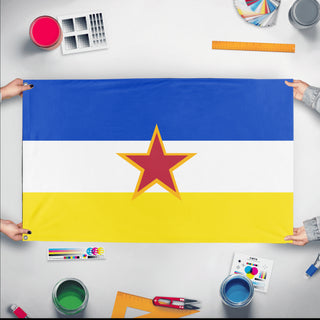 A mockup of the custom flag 'SR Gabrielland flag' held up on a table during print checking
