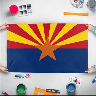 A mockup of the custom flag 'Arizona State Flag' held up on a table during print checking