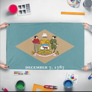 A mockup of the custom flag 'Delaware State Flag' held up on a table during print checking