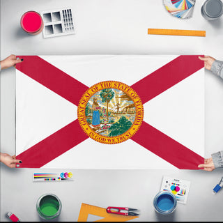 A mockup of the custom flag 'Florida State Flag' held up on a table during print checking