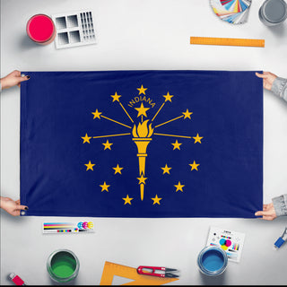 A mockup of the custom flag 'Indiana State Flag' held up on a table during print checking