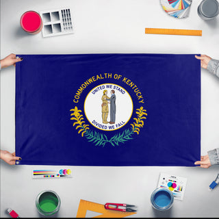 A mockup of the custom flag 'Kentucky State Flag' held up on a table during print checking