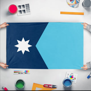 A mockup of the custom flag 'Minnesota State Flag' held up on a table during print checking