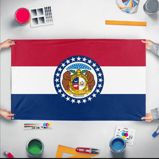 A mockup of the custom flag 'Missouri State Flag' held up on a table during print checking