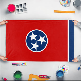 A mockup of the custom flag 'Tennessee State Flag' held up on a table during print checking