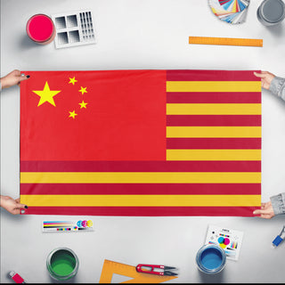 A mockup of the custom flag 'Chinese American Heritage Flag' held up on a table during print checking