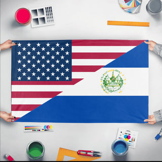 A mockup of the custom flag 'Salvadoran American Heritage Flag' held up on a table during print checking