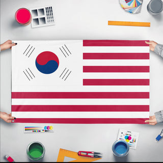 A mockup of the custom flag 'Korean American Heritage Flag' held up on a table during print checking