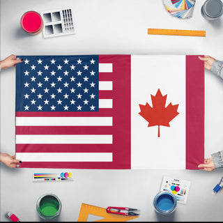 A mockup of the custom flag 'Canadian American Heritage Flag' held up on a table during print checking