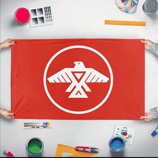 A mockup of the custom flag 'Anishinaabe First Nations Flag' held up on a table during print checking