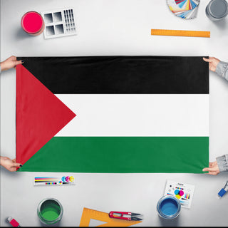 A mockup of the custom flag 'pal flag' held up on a table during print checking