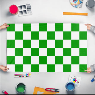 A mockup of the custom flag 'Green and White Checkered flag' held up on a table during print checking