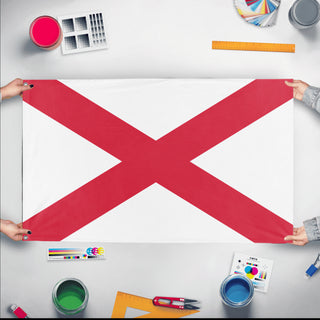 A mockup of the custom flag 'Racing White with Red Cross Flag' held up on a table during print checking