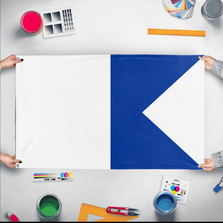 A mockup of the custom flag 'Alfa Signal Flag' held up on a table during print checking