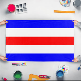 A mockup of the custom flag 'Charlie Signal Flag' held up on a table during print checking