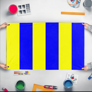 A mockup of the custom flag 'Golf Signal Flag' held up on a table during print checking