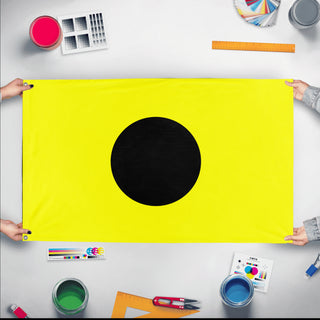 A mockup of the custom flag 'Indie Signal Flag' held up on a table during print checking