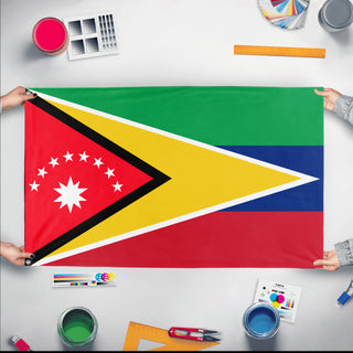 A mockup of the custom flag 'Venezuela Guyana Union flag' held up on a table during print checking