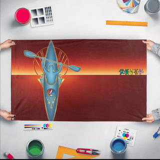A mockup of the custom flag 'Kayak 1 With Bears flag' held up on a table during print checking