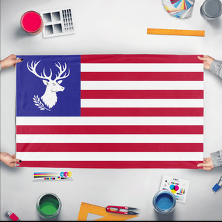 A mockup of the custom flag 'Whitetail Union flag' held up on a table during print checking