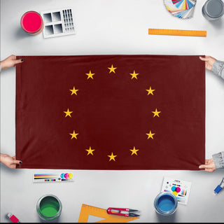 A mockup of the custom flag 'Alexandria flag' held up on a table during print checking