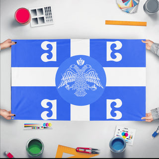 A mockup of the custom flag 'Neo  Byzantine Empire  flag' held up on a table during print checking