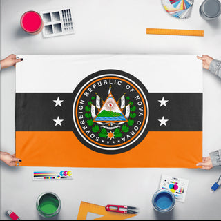 A mockup of the custom flag 'Sovereign republic of Nova Corva flag' held up on a table during print checking