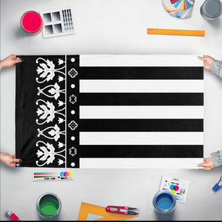 A mockup of the custom flag 'senyera reial bn flag' held up on a table during print checking
