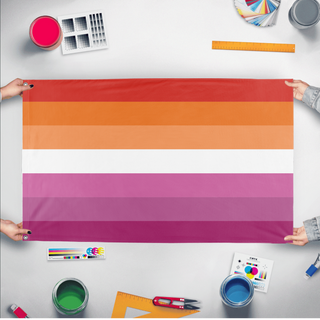 A mockup of the custom flag 'Lesbian Flag' held up on a table during print checking