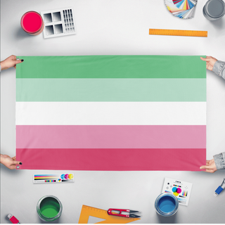 A mockup of the custom flag 'Abrosexual Flag' held up on a table during print checking